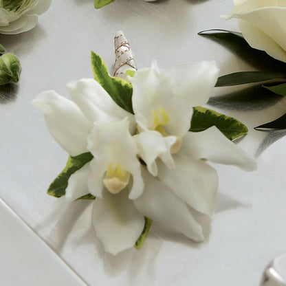 White Mini Cymbidium Boutonniere – FLORAL CREATIONS & GIFTS, Weslaco TX